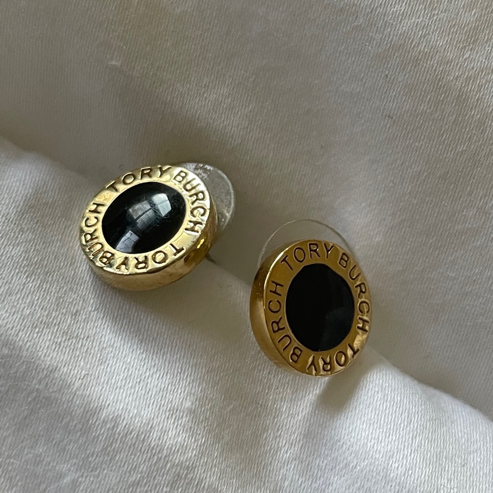 Black and gold Tory Burch studs